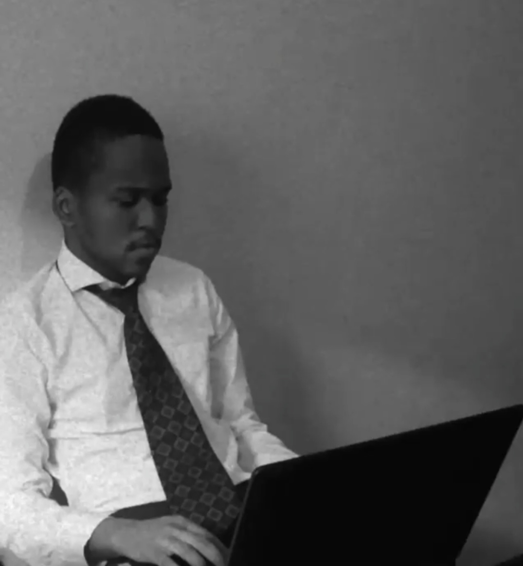 Edwin working on a laptop