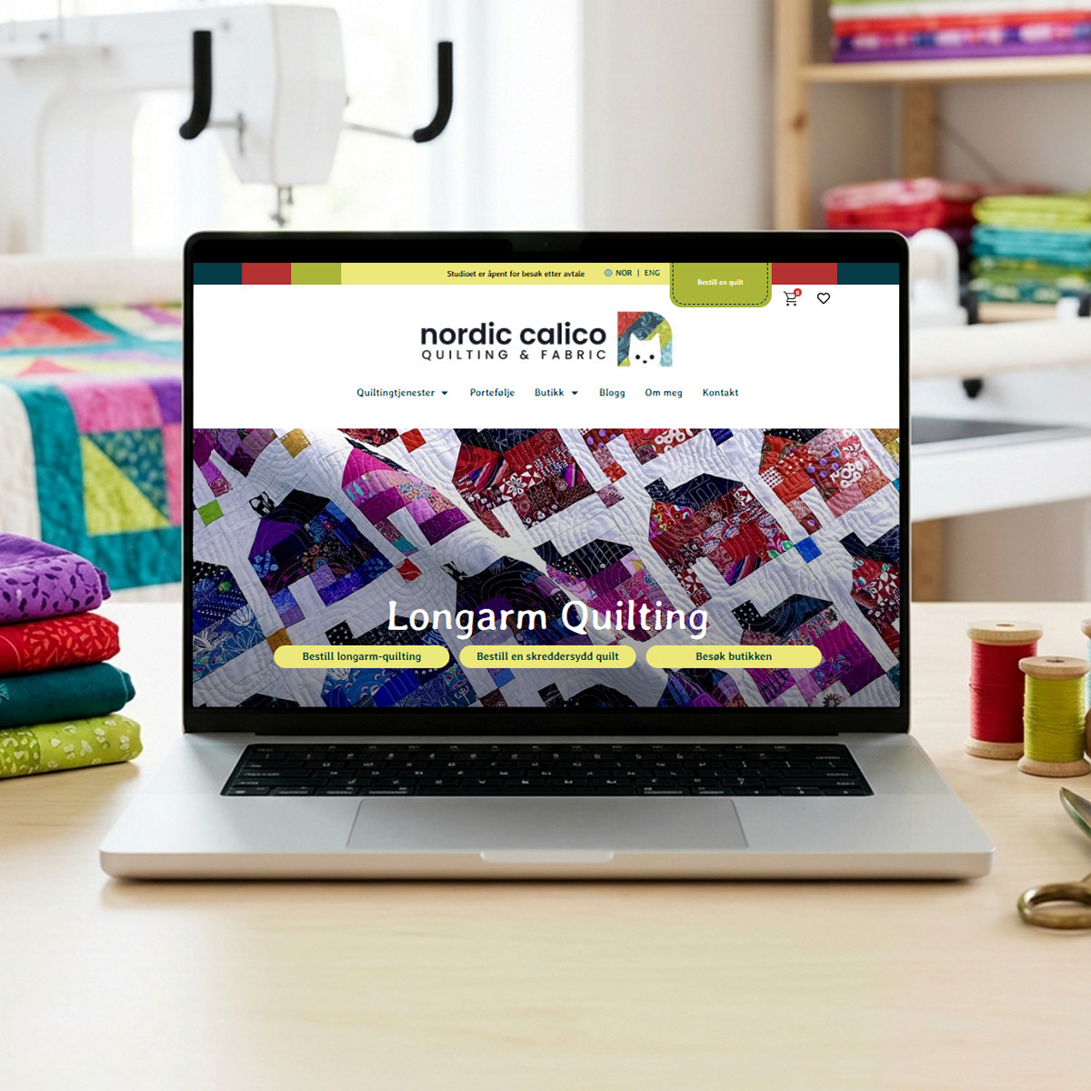 Nordic Calico website on a laptop in a bright quilting studio